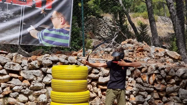 archer aiming e1638451869912