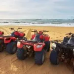 quad bikes beach sea