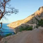 road beside sea hvar island scaled e1638454000486